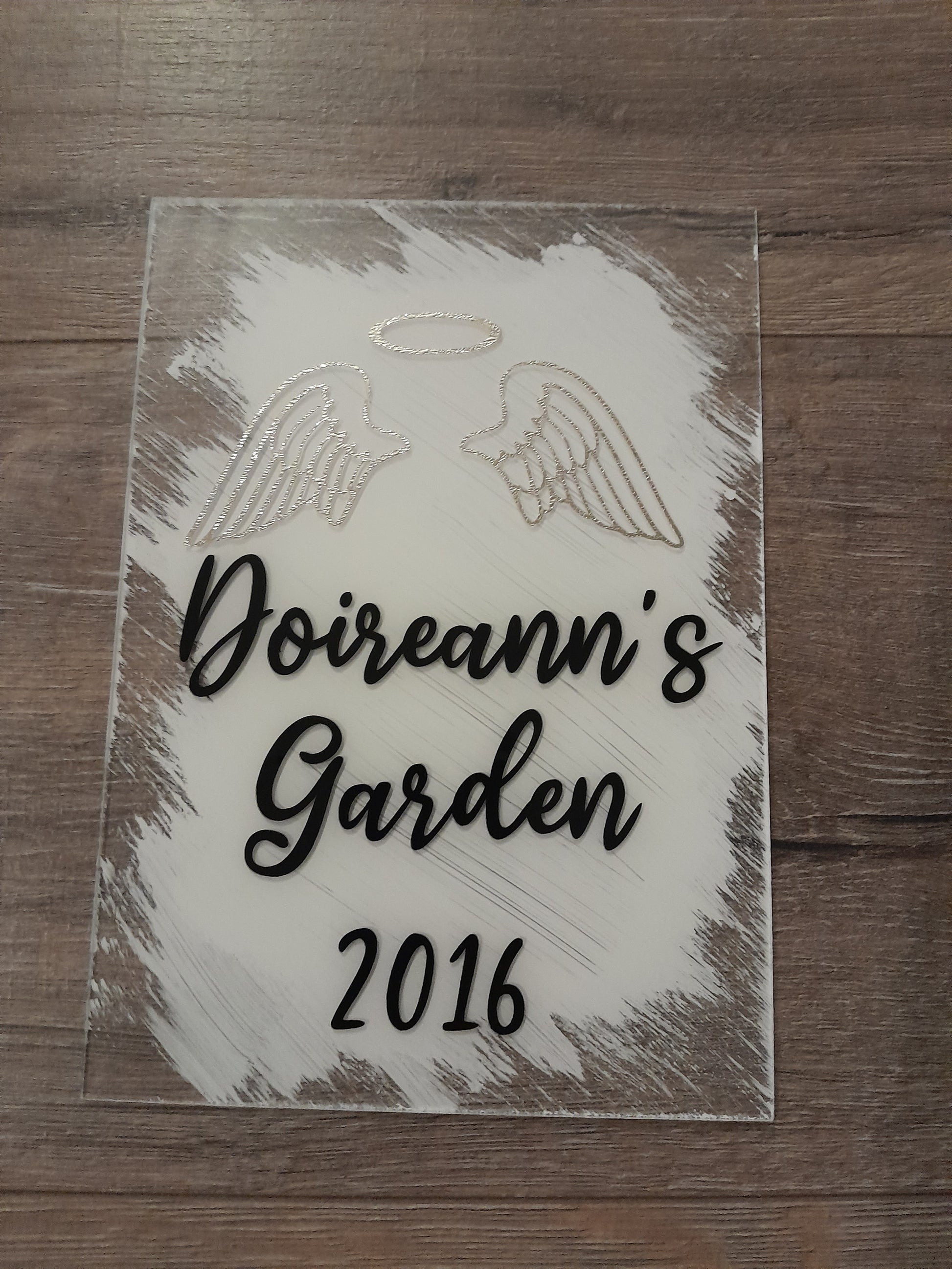 acrylic Memorial Plaques. angel wings with text "Nana, gone but never forgotten"