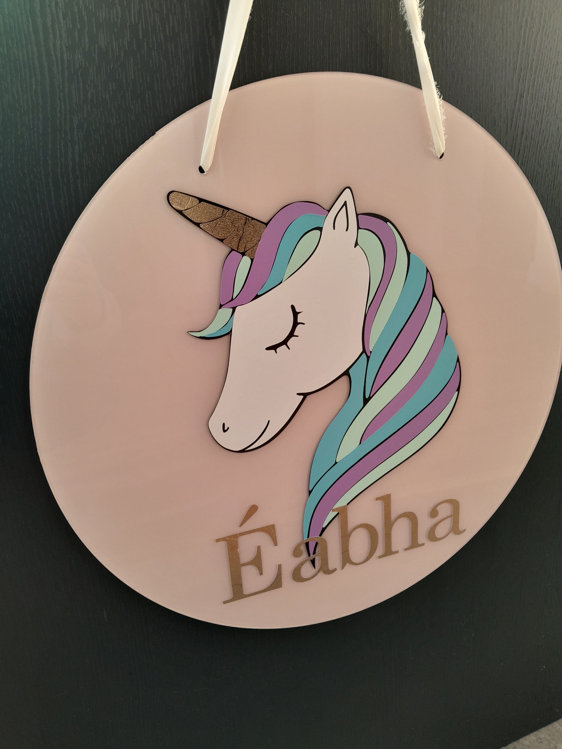 Add a touch of magic to room decor with the statement Unicorn Name Sign. These are available from 20cm to 40cm and come with hanging holes and a ribbon. They are made fr