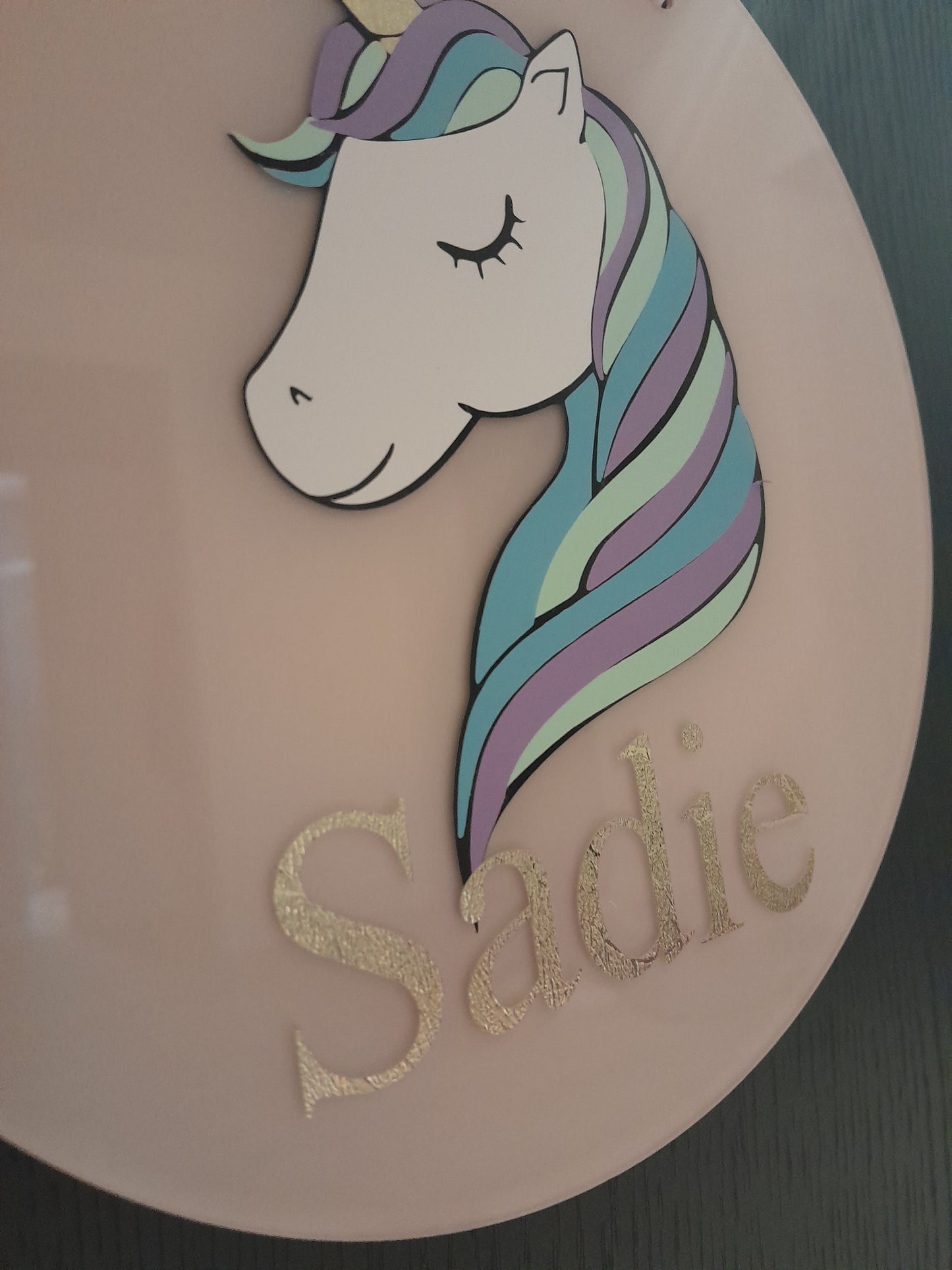 Add a touch of magic to room decor with the statement Unicorn Name Sign. These are available from 20cm to 40cm and come with hanging holes and a ribbon. They are made fr