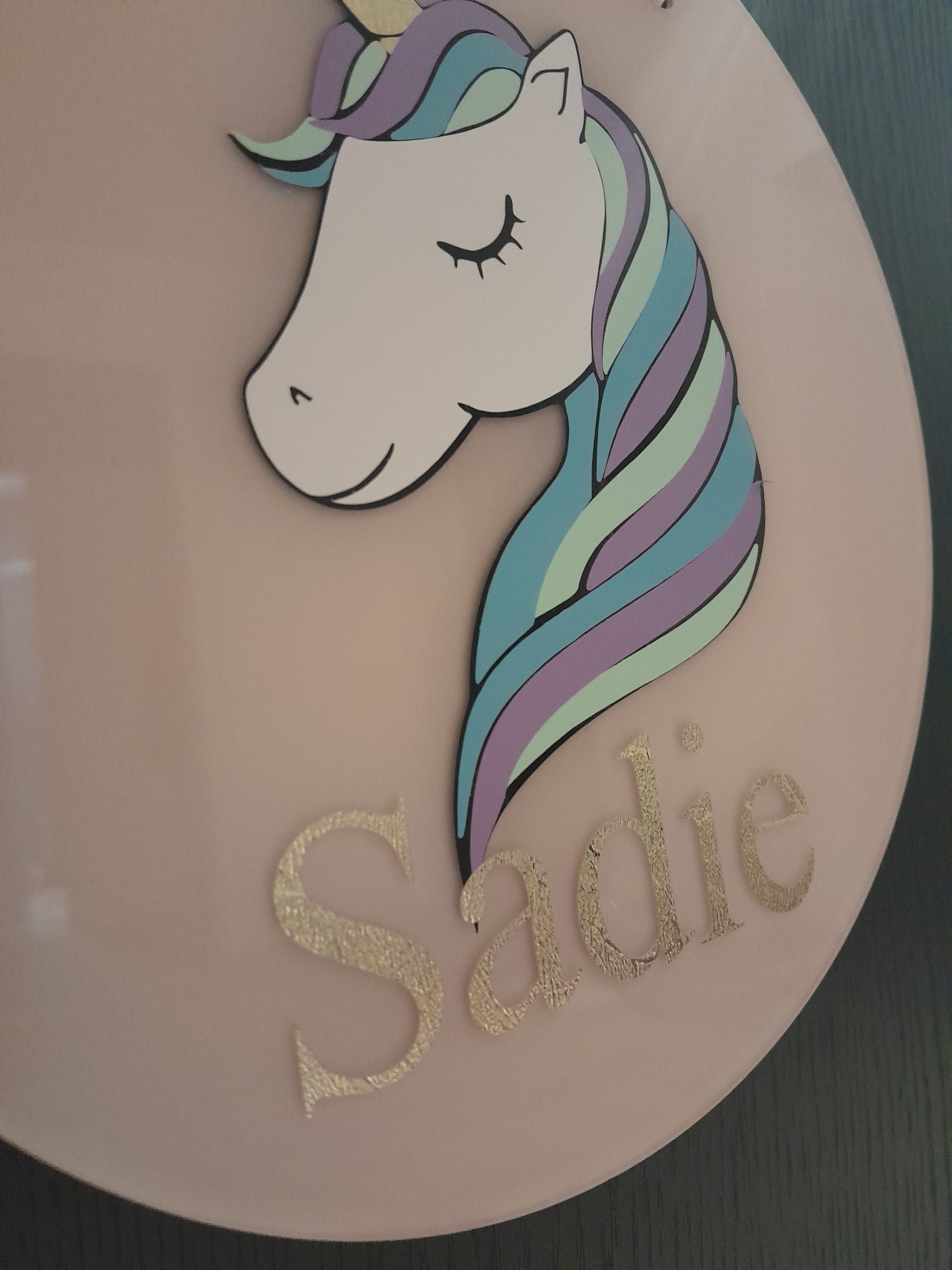 Add a touch of magic to room decor with the statement Unicorn Name Sign. These are available from 20cm to 40cm and come with hanging holes and a ribbon. They are made fr